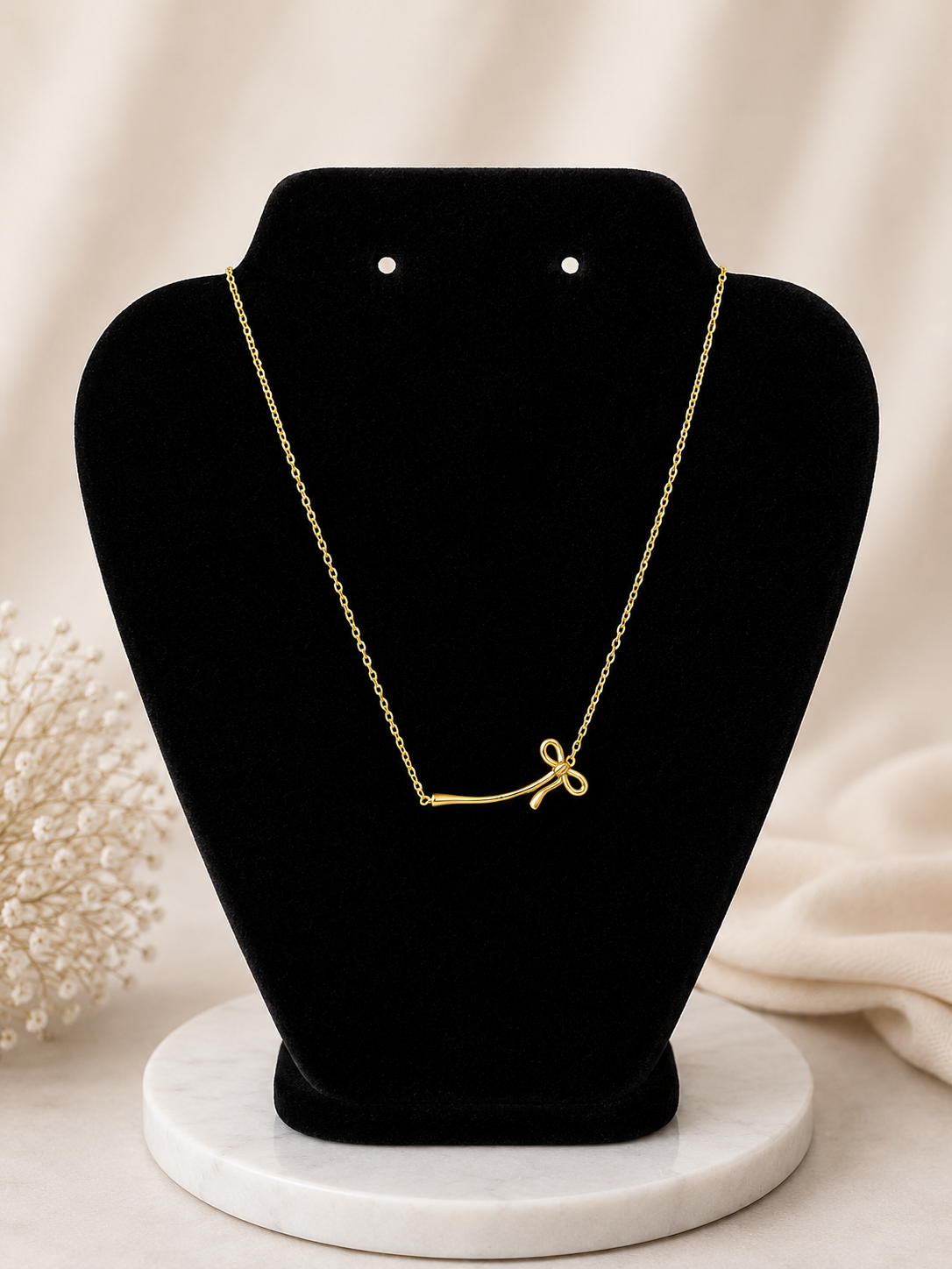Aurelia bow necklace
